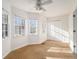 Bright bedroom with a ceiling fan, carpet floors and double windows with a view at 436 Avery St, Decatur, GA 30030