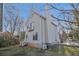 Rear view of a two-story home with a balcony and a tall chimney, showcasing its architecture and design at 436 Avery St, Decatur, GA 30030