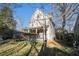 Traditional home with a covered front porch, showcasing its well-kept lawn and curb appeal at 436 Avery St, Decatur, GA 30030