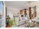 Open concept living area with hardwood floors, a comfortable sofa, and seamless flow to the dining area at 436 Avery St, Decatur, GA 30030