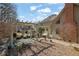Backyard showcasing a pergola, gazebo, and brick chimney extending from the side of the house at 3290 Spain Rd, Snellville, GA 30039