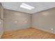 Room with laminate flooring and a neutral paint color at 3290 Spain Rd, Snellville, GA 30039