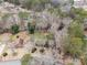 Overhead view of residential properties nestled among trees at 4352 Treeline Way, Douglasville, GA 30135