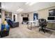 Finished basement featuring a multi-purpose layout with a home office and a relaxed lounging area at 4352 Treeline Way, Douglasville, GA 30135
