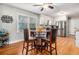 Inviting kitchen featuring a dining area, stainless steel appliances, and natural light at 4352 Treeline Way, Douglasville, GA 30135