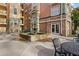 Charming courtyard featuring a stone fountain, surrounded by tables and chairs for outdoor relaxation at 10 Perimeter Summit Ne Blvd # 4243, Brookhaven, GA 30319