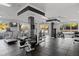 On-site gym with modern exercise equipment and large windows for natural light and views at 10 Perimeter Summit Ne Blvd # 4243, Brookhaven, GA 30319