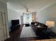 Inviting living room with ceiling fan, hardwood floors, and natural light at 10 Perimeter Summit Ne Blvd # 4243, Brookhaven, GA 30319