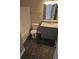 Bathroom featuring tile floors, modern vanity, and a tub with shower at 1012 Riverclift Dr, Covington, GA 30016