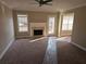 A cozy living room with a fireplace and access to the deck at 1012 Riverclift Dr, Covington, GA 30016