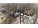 An aerial view of a charming house with trees in a suburban neighborhood at 1870 Avon Sw Ave, Atlanta, GA 30311