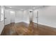 Spacious bedroom with hardwood floors, updated lighting, and plenty of room for furnishings at 1870 Avon Sw Ave, Atlanta, GA 30311
