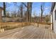 A lovely wooden deck overlooks the verdant yard, perfect for outdoor relaxation at 1870 Avon Sw Ave, Atlanta, GA 30311