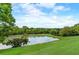 A lovely pond surrounded by trees at 86 De Arc Nw Pl, Atlanta, GA 30327