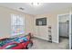 Fun bedroom with car bed, wall-mounted TV, and ample space at 1647 Club Vista Trce, Stone Mountain, GA 30088