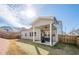 Backyard featuring a covered patio with a ceiling fan, ideal for enjoying the outdoors at 614 Denali Dr, Mableton, GA 30126