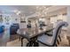 Elegant dining room with modern lighting, seamlessly connecting to living spaces at 614 Denali Dr, Mableton, GA 30126