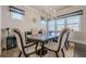 Elegant dining room with stylish chandelier and window treatments at 614 Denali Dr, Mableton, GA 30126