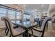 Dining area featuring elegant chandelier and view into the living room at 614 Denali Dr, Mableton, GA 30126