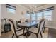 Elegant dining room with stylish chandelier and window treatments at 614 Denali Dr, Mableton, GA 30126