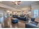 Spacious open-concept living room with hardwood floors and ample seating at 614 Denali Dr, Mableton, GA 30126