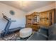 Cozy room features a treadmill, cabinet, and leather couch at 614 Denali Dr, Mableton, GA 30126