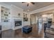 Open-concept living room with fireplace and built-in shelving at 614 Denali Dr, Mableton, GA 30126