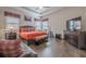 Main bedroom featuring hardwood floors, ceiling fan, and a sitting area at 614 Denali Dr, Mableton, GA 30126