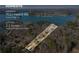Aerial view of the homesite, with lake views, boundaries, acreage, and address at 7530 Heard Rd, Cumming, GA 30041