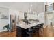 Well-equipped kitchen featuring sleek countertops, stainless steel appliances, and ample cabinet space for storage at 7530 Heard Rd, Cumming, GA 30041