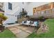 Outdoor patio with seating and lake themed decor for a relaxed and inviting space at 7530 Heard Rd, Cumming, GA 30041