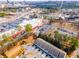 Aerial shot of townhomes with convenient access to nearby shopping, dining, and city amenities at 1012 Rohner Way, Smyrna, GA 30080