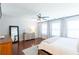 Bedroom featuring wood floors, natural light, and a large mirror at 1012 Rohner Way, Smyrna, GA 30080