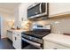 Close-up of modern stainless steel appliances and white cabinets in a bright kitchen at 1012 Rohner Way, Smyrna, GA 30080