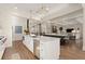 Spacious kitchen with a large island, modern lighting, and stainless steel appliances at 6170 Wellington Ct, Cumming, GA 30040