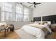 Bright bedroom featuring large windows, hardwood floors, and minimalist decor at 978 North Ne Ave # 307, Atlanta, GA 30306