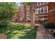 Well-maintained lawn and mature trees complement the exterior of this lovely building at 978 North Ne Ave # 307, Atlanta, GA 30306