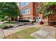 Beautifully landscaped exterior entrance with stone walkway leading to the front door at 978 North Ne Ave # 307, Atlanta, GA 30306