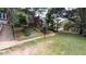 Lush grassy lawn and mature shade trees provide a peaceful outdoor setting at 978 North Ne Ave # 307, Atlanta, GA 30306