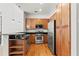 Well-equipped kitchen features stainless steel appliances and wood cabinets at 978 North Ne Ave # 307, Atlanta, GA 30306