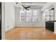 Bright living room with hardwood floors, high ceilings and large windows providing natural light at 978 North Ne Ave # 307, Atlanta, GA 30306