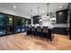 Modern kitchen with black cabinets, stainless steel appliances and a large island with seating at 4132 Carmain Ne Dr, Atlanta, GA 30342