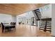 Open floor plan boasting hardwood floors, a modern staircase, and large windows filling the space with natural light at 4132 Carmain Ne Dr, Atlanta, GA 30342