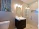 Modern bathroom with a glass enclosed shower, tile details, and vanity at 636 Counsel Ne Dr, Marietta, GA 30068