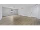 Spacious basement with modern flooring, recessed lighting, and a clean, finished look at 9035 Teal Ln, Jonesboro, GA 30236