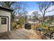 Outdoor back deck complete with gas grill and patio furniture at 1171 Eggleston Sw St, Atlanta, GA 30310