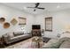 Bright living room with a sectional sofa, media console, and stylish decor at 1171 Eggleston Sw St, Atlanta, GA 30310