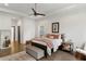 Bright main bedroom with ceiling fan and hardwood floors offers a cozy, relaxing space at 1171 Eggleston Sw St, Atlanta, GA 30310