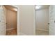 Two closets, one with vinyl flooring and one with carpet at 5669 Casa Blanca Ln, Atlanta, GA 30331