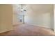 Large main bedroom features neutral paint, carpet floors, vaulted ceiling and a bright window at 5669 Casa Blanca Ln, Atlanta, GA 30331